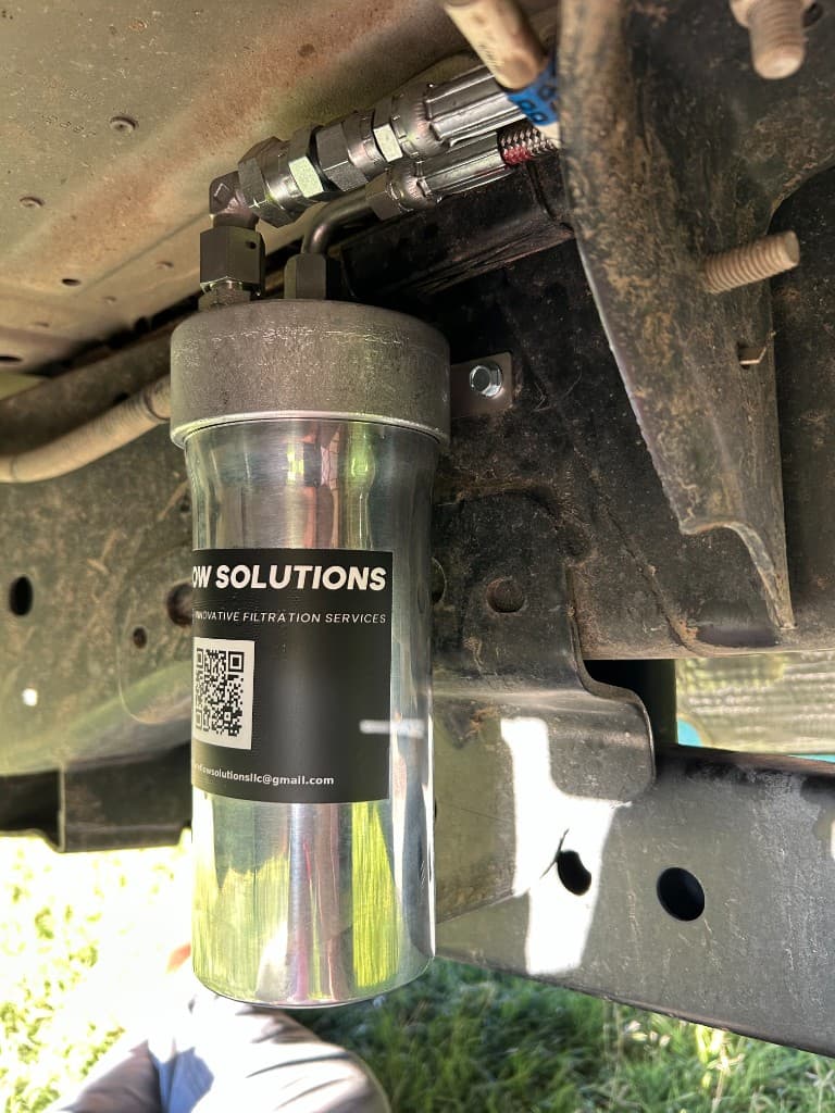 Engine oil bypass filter installation on truck chassis